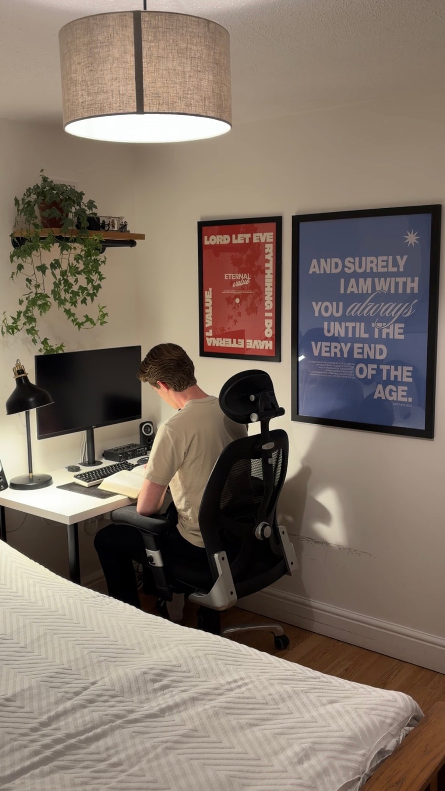 Two art prints on the wall in a bedroom